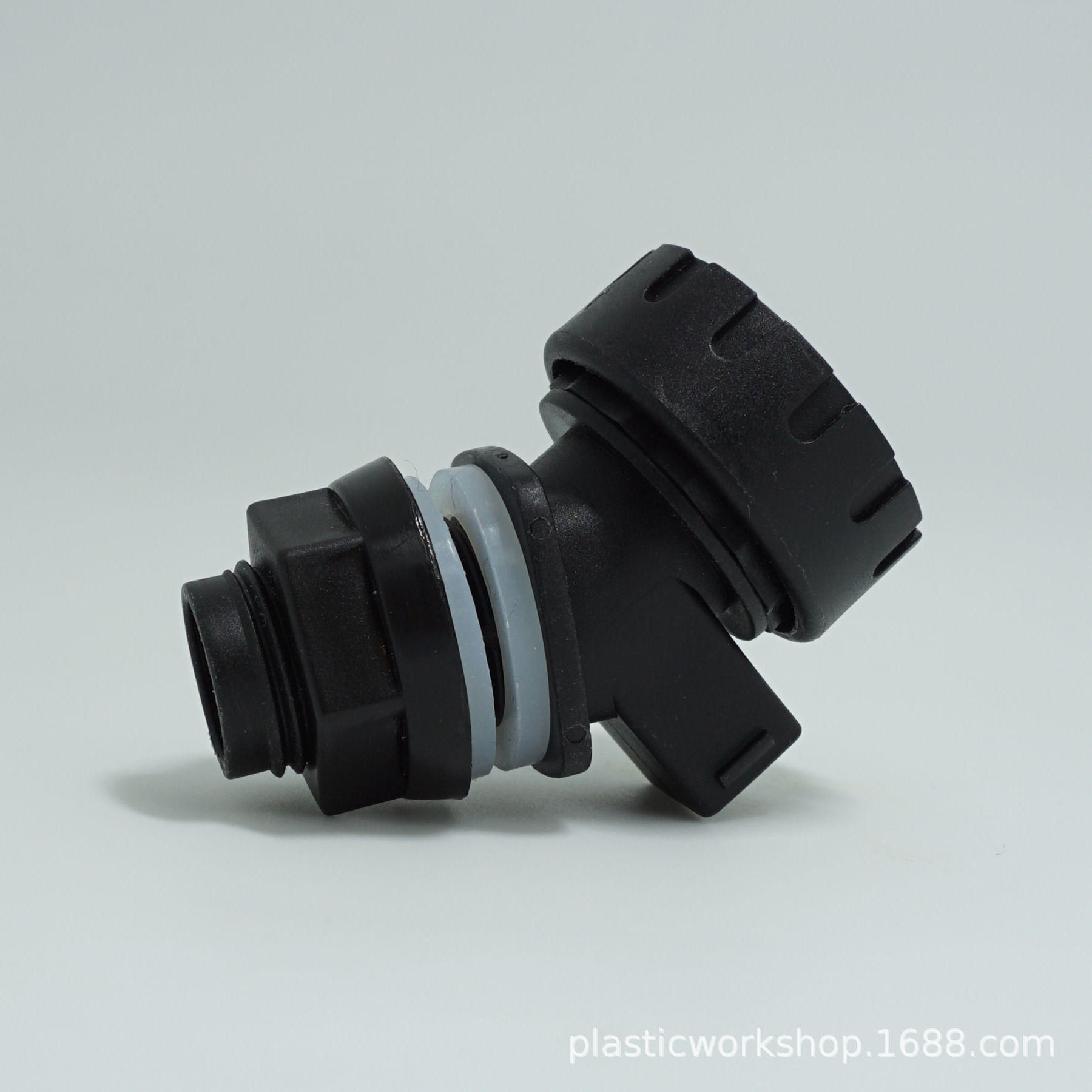 All-black bucket faucet with a rotary knob for brewing wine bottles, dust cover, dust plug, bucket faucet Application Scenario