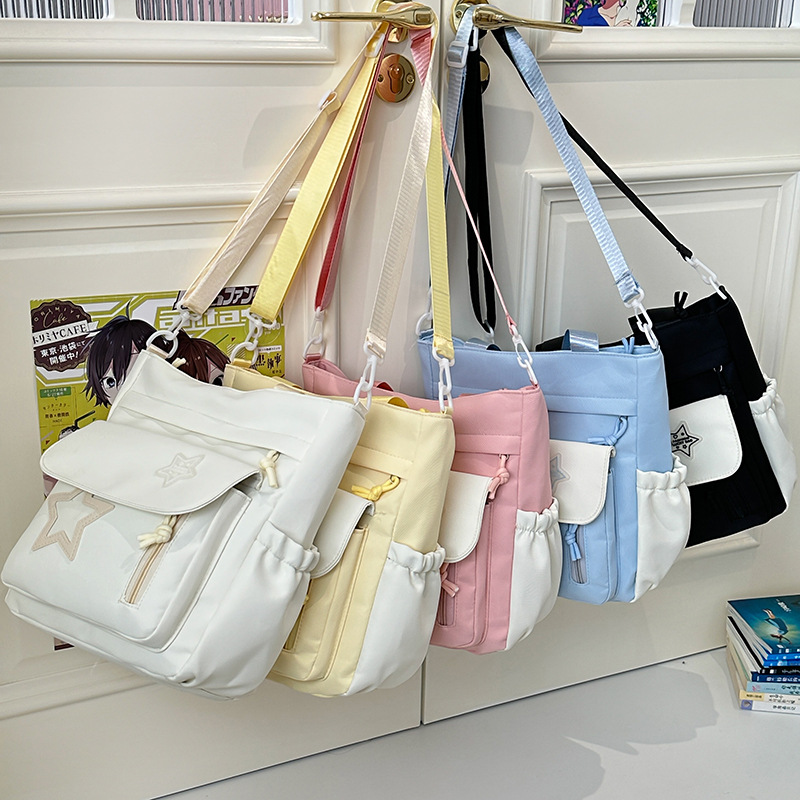 A new sweet Japanese-style girl's tutorial bag, a versatile Korean-style girl's crossbody bag, and a fresh and cute junior and senior high school tutorial bag full figure