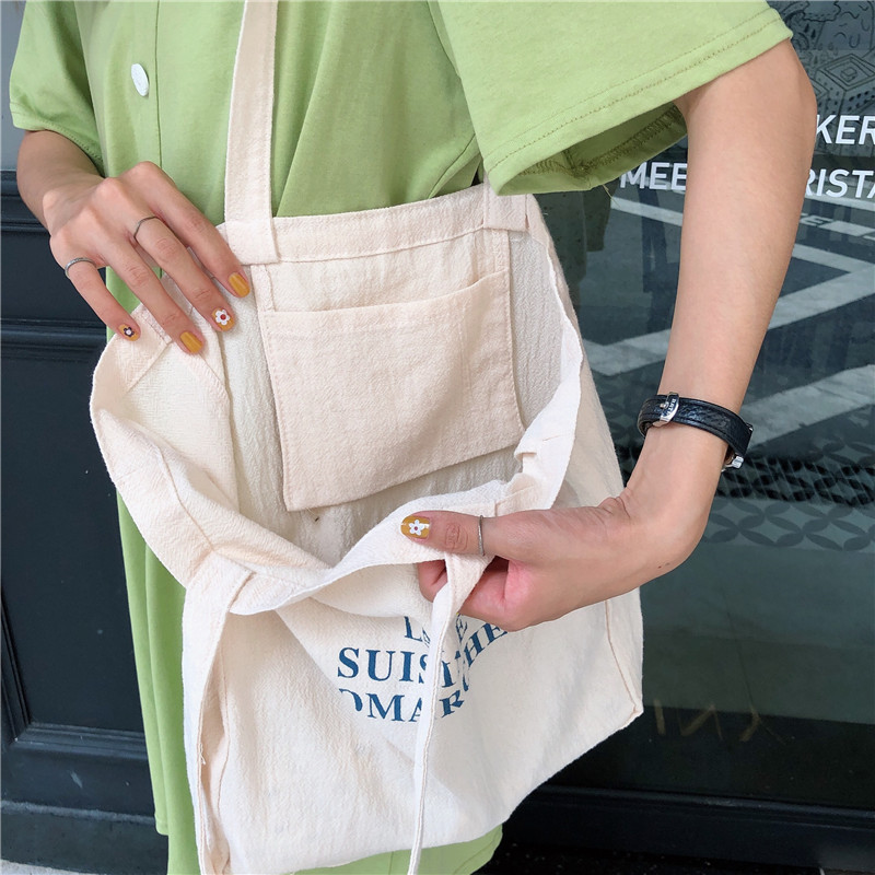 【 In Stock 】96152 Korean fresh and clean handbag, single-shoulder bag wholesale, student casual hand-held shopping bag for women Application Scenario
