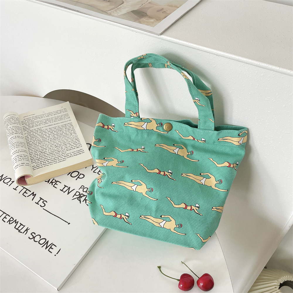 Z13 Bento Bag, small cloth bag, printed swimming style, hand-held bento bag, work lunch box bag, storage women's handbag Application Scenario