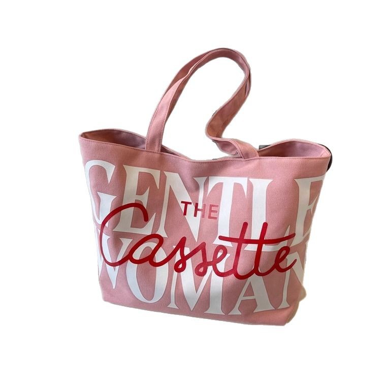 Large-capacity letter-shaped tote bag for women, 2025 new niche single-shoulder canvas bag, versatile ins commuting and tutorial bag Item Picture