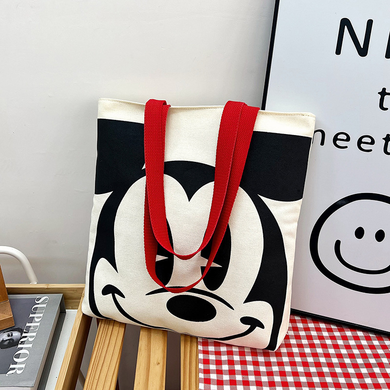 A new 2024 spring collection of cute cartoon color-blocking canvas single-shoulder crossbody change bag for both men and women full figure