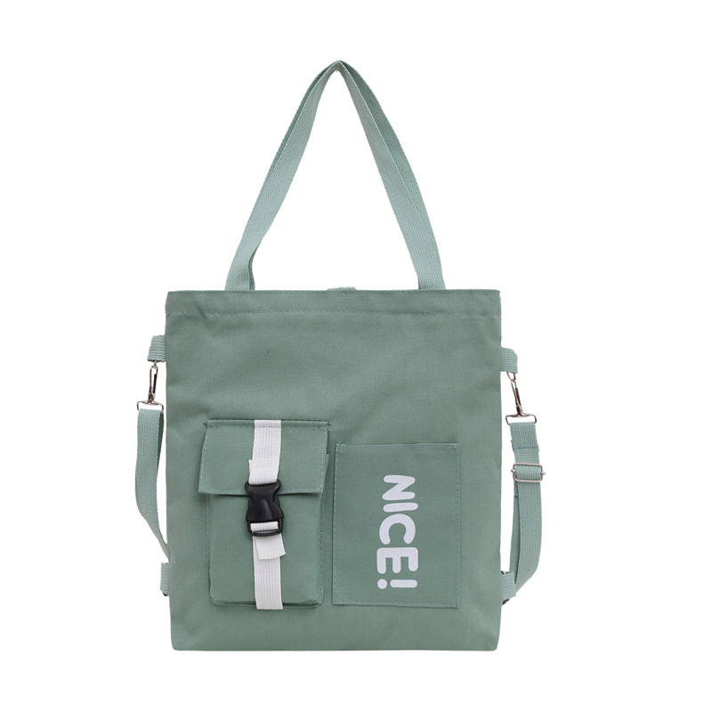 A large-capacity crossbody bag for spring 2024, featuring Japanese and Korean printed canvas for women and a student single-shoulder canvas bag with logo printing Item Picture