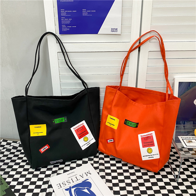 Korean style ins letter-printed open-top thin shoulder strap large-capacity canvas bag, simple and casual single-shoulder bag and schoolbag for women details Picture