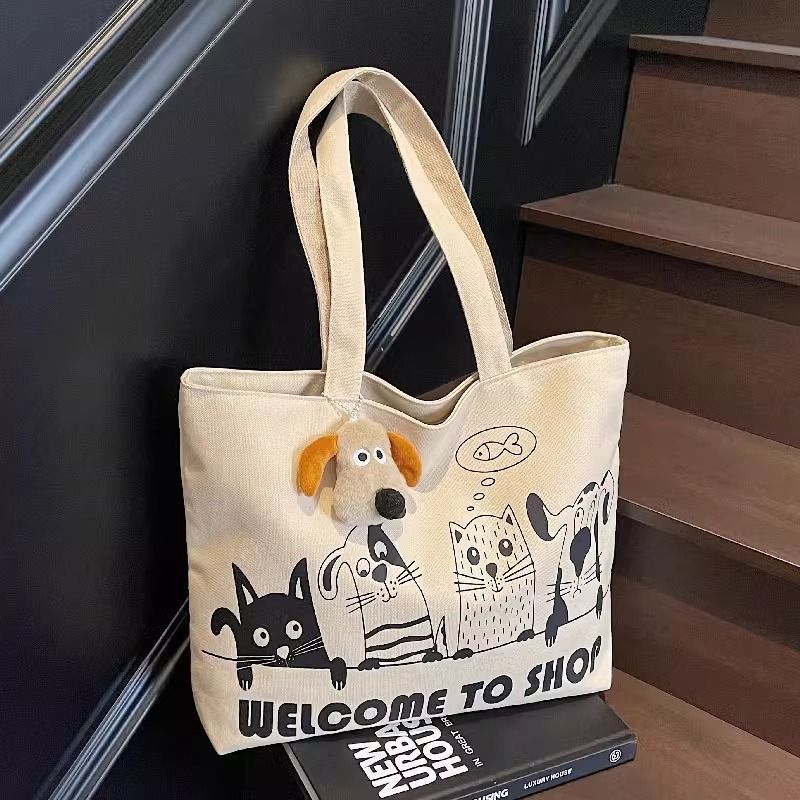 New canvas bag for women 2025, large capacity student shoulder bag, versatile cartoon tote handbag, tote commuter bag full figure