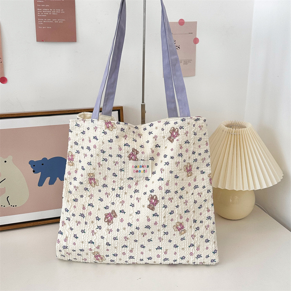 4431 Korean-style soft and cute embossed canvas bag with a girlish heart, single-shoulder double-layer bag, large capacity student schoolbag Application Scenario