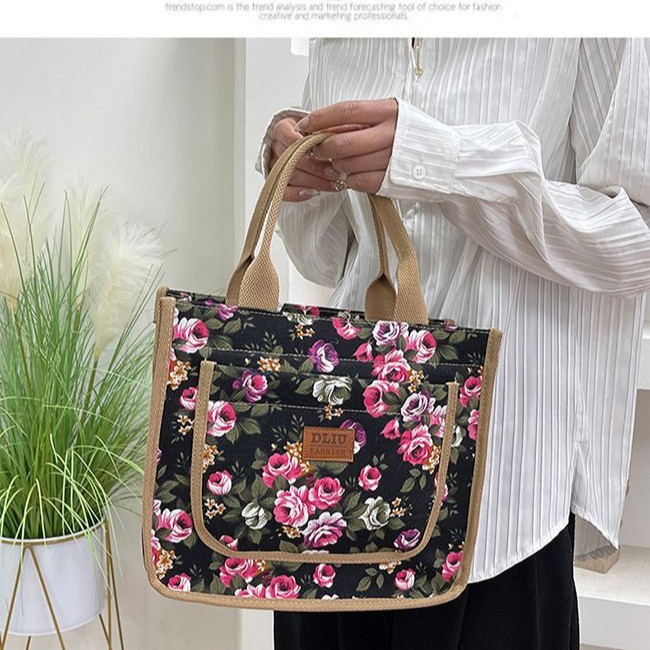 The new thickened canvas handbag is suitable for carrying out by hand. It features an aluminum foil insulation layer and comes with a lunch box and lunch box details Picture