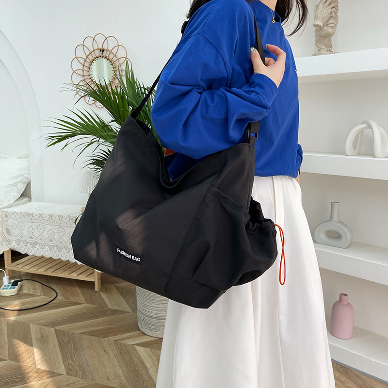 Korean-style canvas bag crossbody bag, women's backpack, simple and versatile, new trendy class bag, large-capacity student single-shoulder crossbody bag Application Scenario