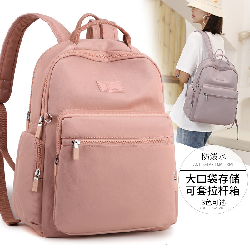 This is a large-capacity water-resistant nylon backpack for both men and women. It is fashionable for travel and leisure, and can be worn with a suitcase full figure