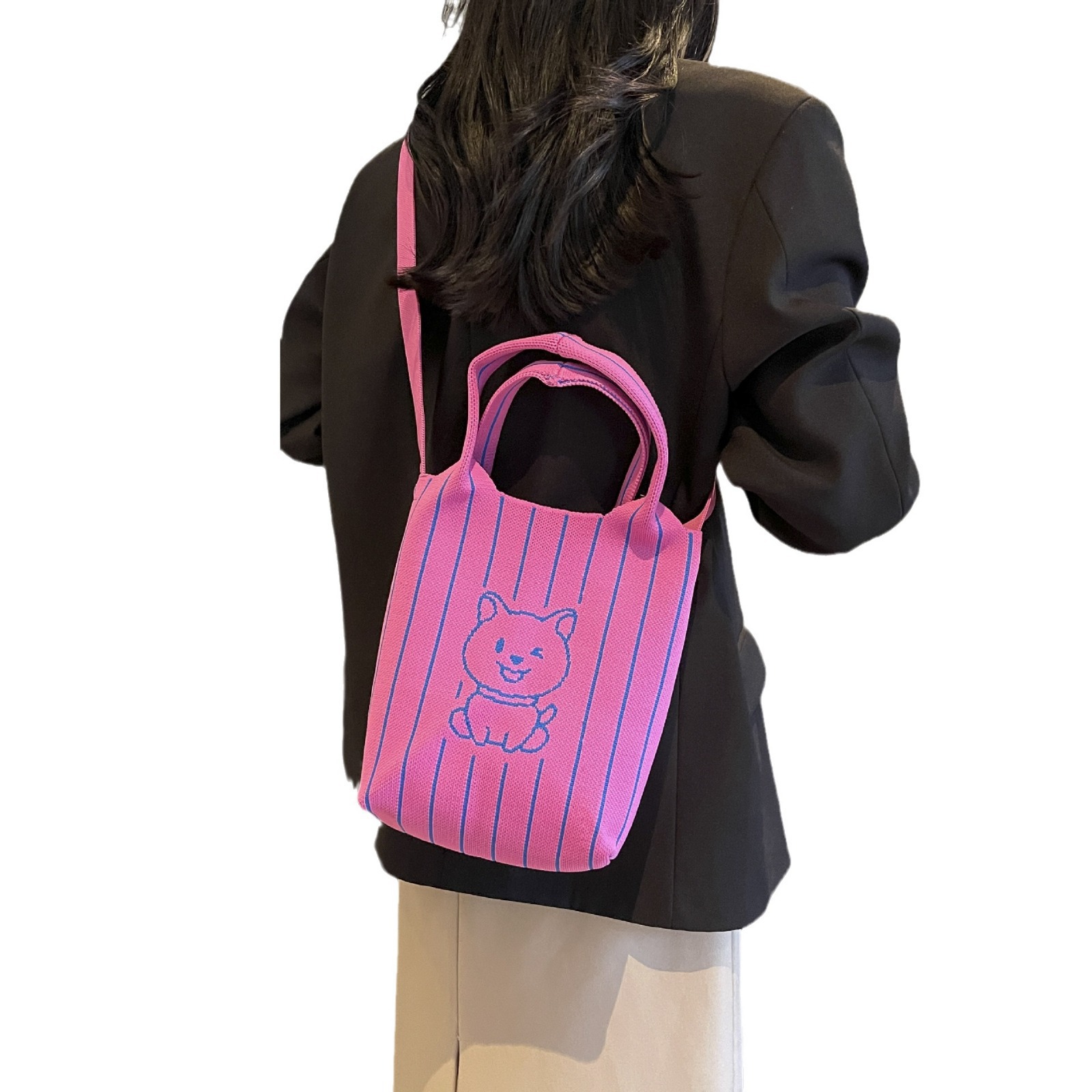 This handbag is a stylish knitted striped shopping bag. It's a popular lady's bear large-capacity tote single-shoulder bag for going out Item Picture