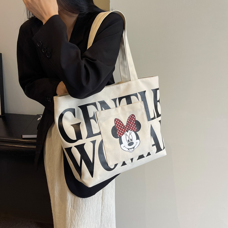 2024 New canvas bag for women, single-shoulder, student, book, large-capacity hand-held bag with zipper, versatile for office workers' commuting Application Scenario