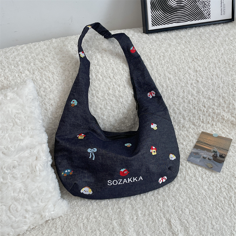 52232 denim crossbody bag, a versatile Korean-style embroidered single-shoulder tote bag, and an ins simple student fabric bag Application Scenario