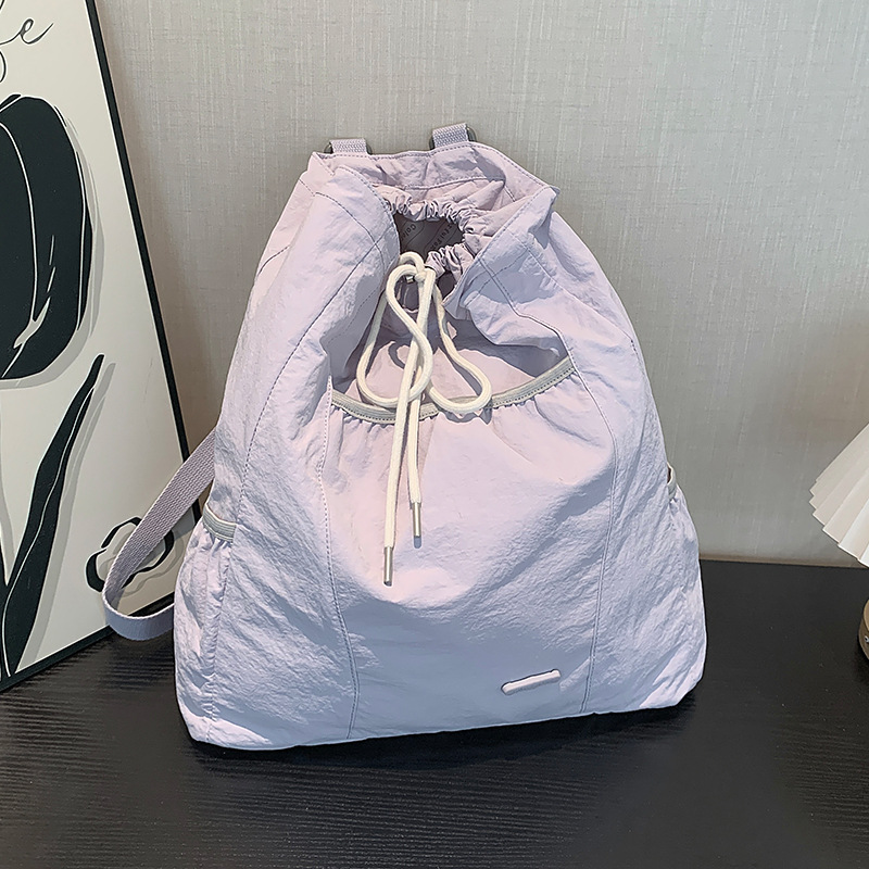 Colorful Fox Korean version Instagram niche design women's casual backpack, school-style lightweight drawstring backpack Application Scenario