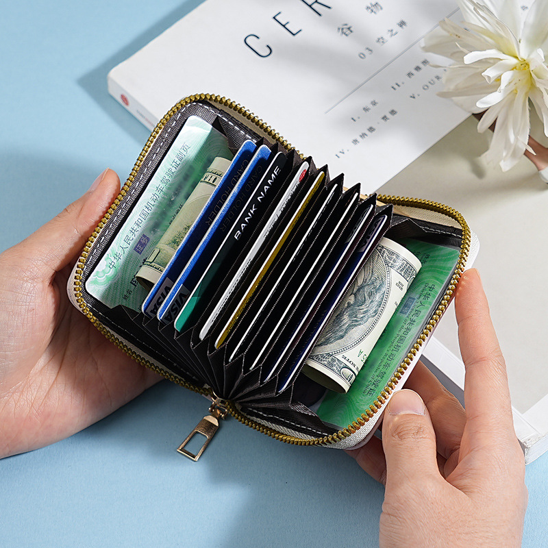 A new compact card case for women with multiple slots, large capacity, anti-demagnetization and anti-theft features, and a Korean version of the ins driver's license card case Specification drawing