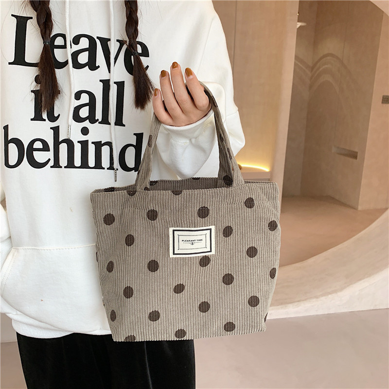 112221 New corduroy retro polka dot handbag, Japanese-style cute smiling face tote bag, women's bento bag Application Scenario