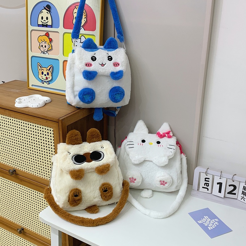 The 2024 new Capybara Capybara multi-purpose cartoon bag and plush bag with a cute little cat slung across it details Picture