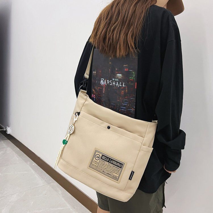 Waterproof handbag for men, Japanese-style casual Instagram, single-shoulder backpack for college students in class, trendy large-capacity crossbody bag for women details Picture