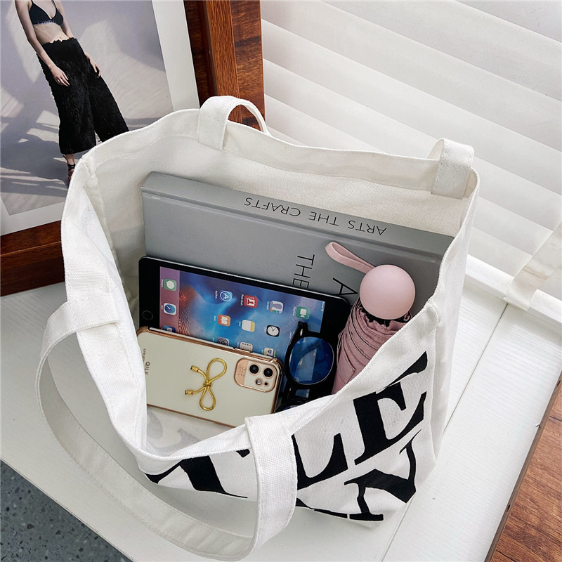Simple letter canvas bag for women, new artistic ins style, large-capacity single-shoulder bag, student class handbag wholesale Application Scenario