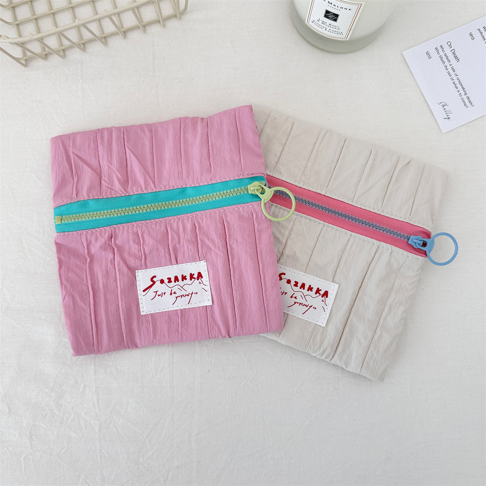 4961 ins color-blocking zipper small cosmetic bag, portable hand-held bag, coin purse, washbasin storage bag Application Scenario