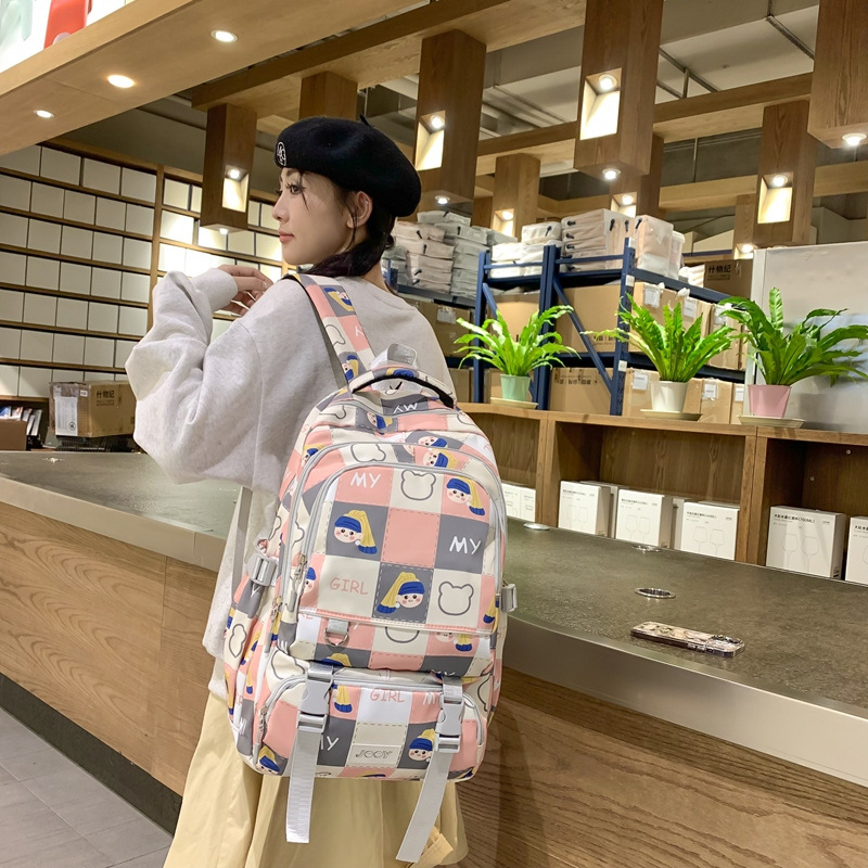 A cute Korean cartoon printed backpack for girls, large-capacity backpack for junior high school, senior high school and university, commuting and going out for primary school students details Picture