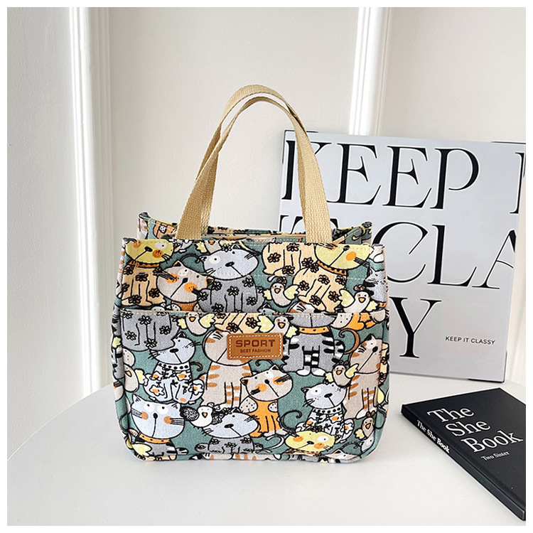 Korean-style fresh and light printed handbag, lunch box for female office workers, lunch box bag, canvas small bag, hand-carried bag, cross-border Application Scenario