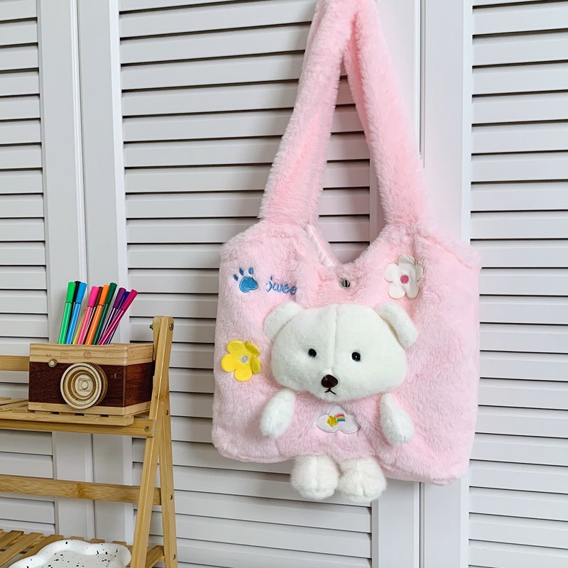 A Korean version of a fresh and cute three-dimensional bear named MAO MAO hand-carried bag with a girlish heart. A large-capacity single-shoulder storage bag for students going out Application Scenario