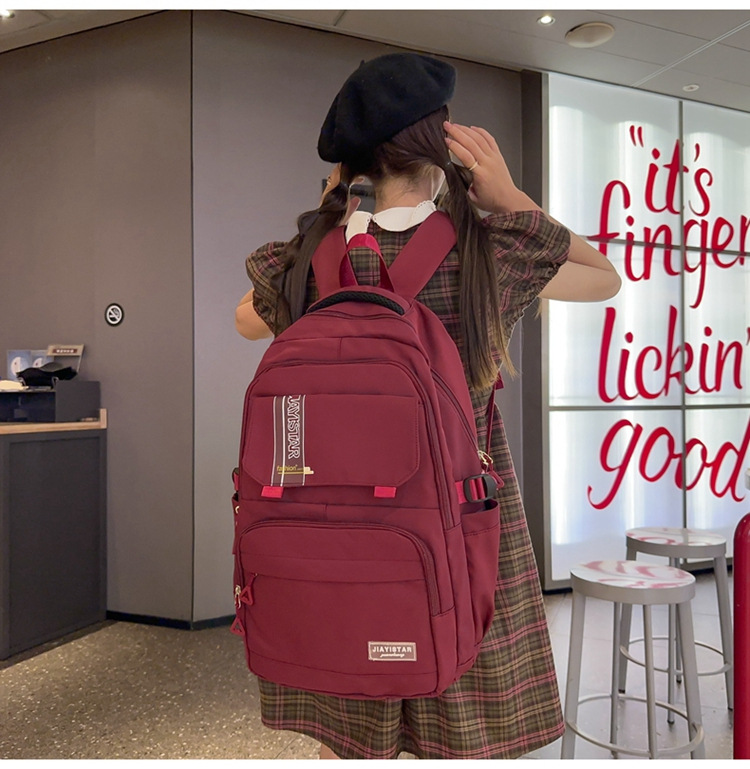 Large-capacity junior high school backpack, travel backpack, niche new style, ins, for high school and college students going on trips details Picture
