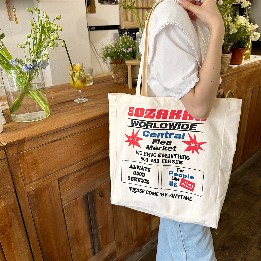 4423 New 2024 printed single-shoulder bag, large-capacity fabric bag, women's canvas bag, trendy hand-held commuting bag for work Application Scenario