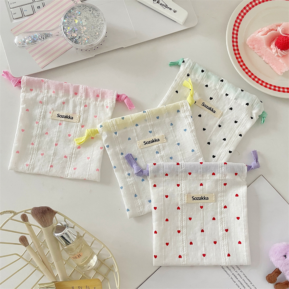 56291 InS-style cute printed heart-shaped storage bag, student sanitary napkin tidying bag, miscellaneous storage cloth bag Application Scenario