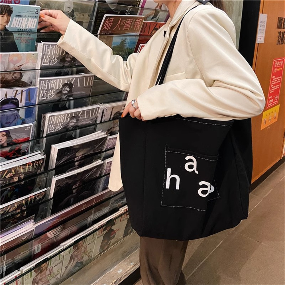 13313 New simple canvas letter Korean-style commuter tote bag, large-capacity single-shoulder bag, casual and fashionable women's bag Item Picture