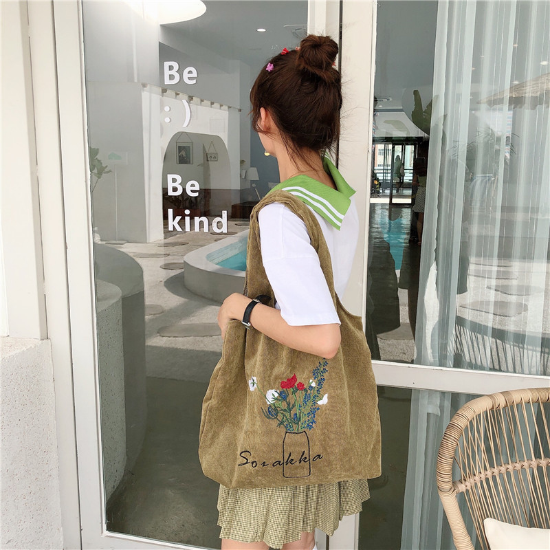 C58 Japanese chic super Fairy bag, ins corduroy embroidery forest girl style artistic hand-held cloth bag search source Application Scenario
