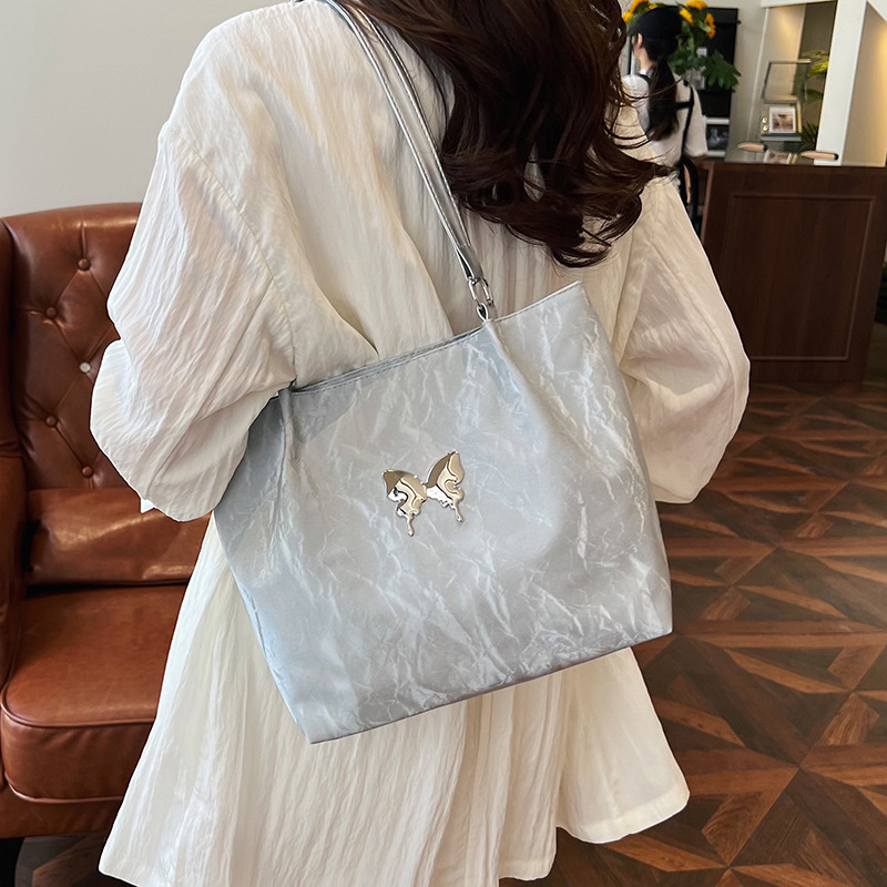 A new large-capacity fashionable ins single-shoulder bag with a gentle texture in the Korean style, a tote bag with a bow, a versatile handbag for women details Picture