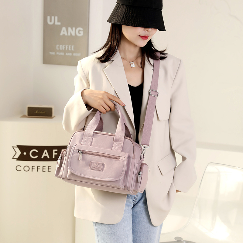 New cross-border women's fashion trend single-shoulder bag, large-capacity water-resistant nylon backpack, multi-layer commuting crossbody bag details Picture