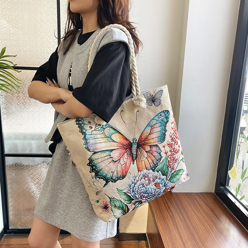 New cross-border double-sided jacquard embroidered canvas bag, ethnic style fashionable butterfly peacock underarm women's bag, single-shoulder bag details Picture