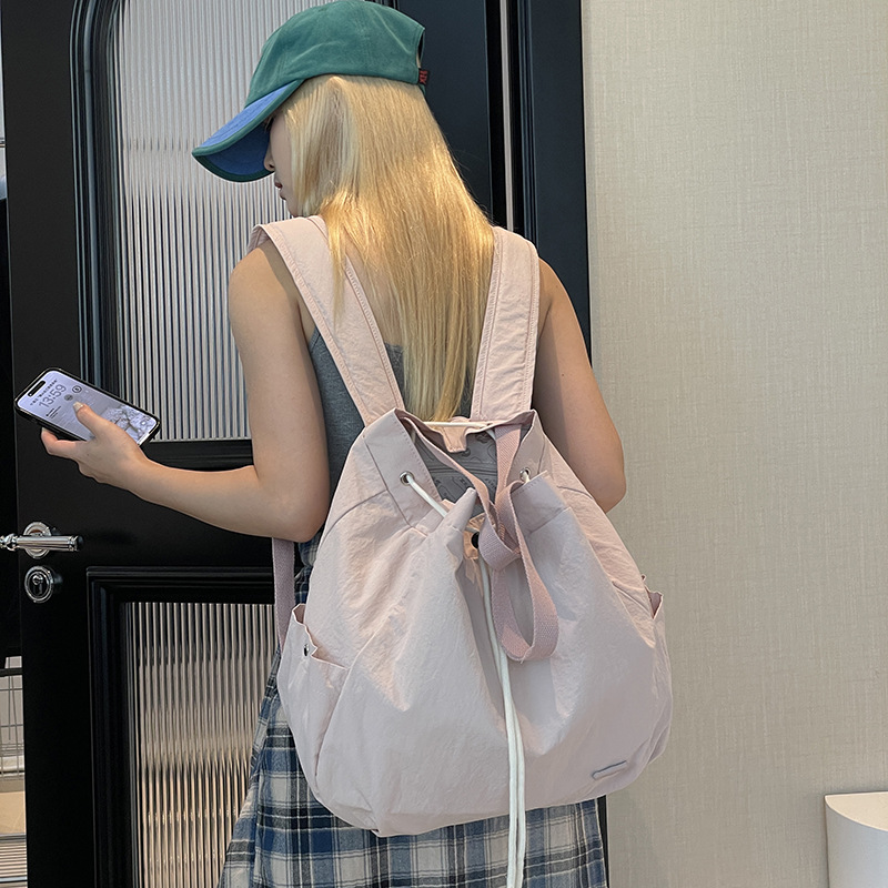Colorful Fox Korean version women's niche drawstring backpack with large capacity nylon lightweight commuting hand shoulder full figure