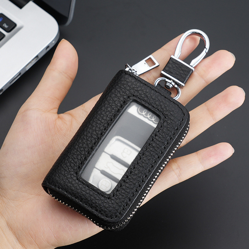The key case is made of genuine soft leather and features a multi-functional waist-hung car key case. It is a popular keychain and remote control key case for men details Picture