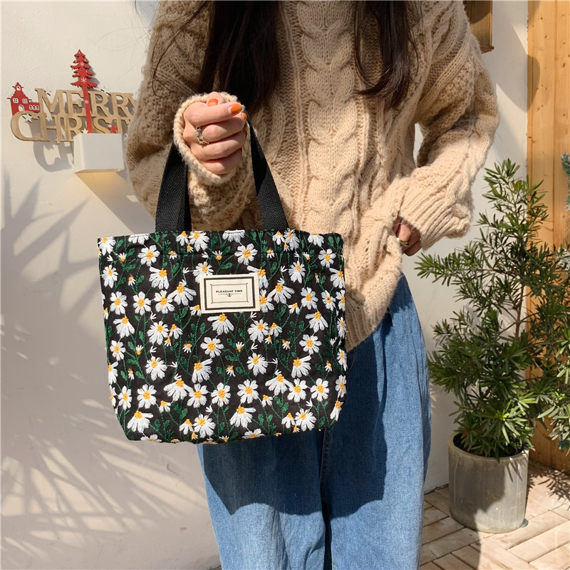 11262 INS Korean Style sweet embroidered Daisy flower handbag, snack storage, bento bag, hand-held mommy bag details Picture