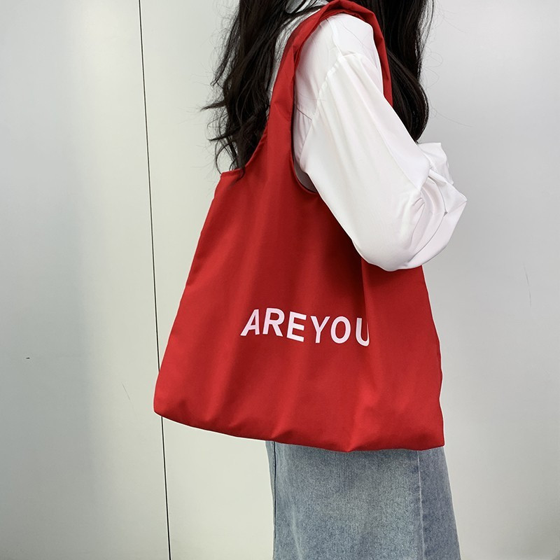 New Korean-style wind mother print single-shoulder bag, large-capacity designer's versatile fabric bag, women's canvas bag, trendy shopping bag Application Scenario