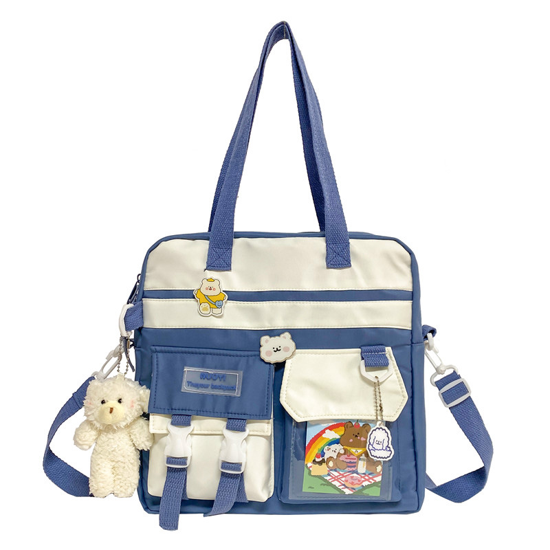 Children's canvas tutorial bag, hand-held bag, waterproof large capacity, double-shoulder tutorial bag, primary school students' single-shoulder crossbody bag Item Picture