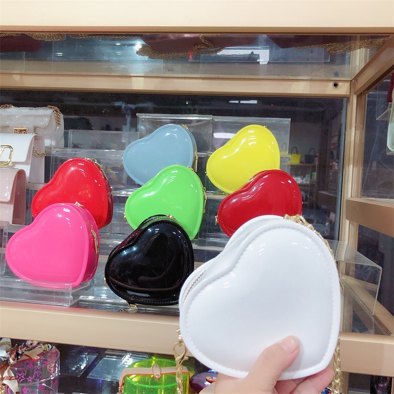 The 2025 new Fairy heart coin purse is fashionable and cute with a mini opening, red envelopes, children's bags and heart-shaped jelly bags full figure