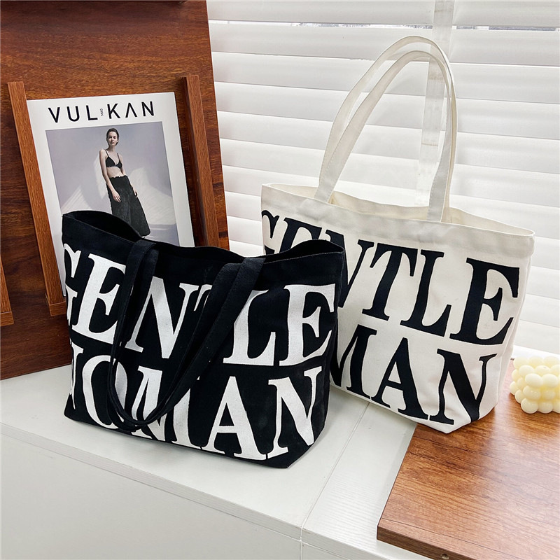 Simple letter canvas bag for women, new artistic ins style, large-capacity single-shoulder bag, student class handbag wholesale full figure