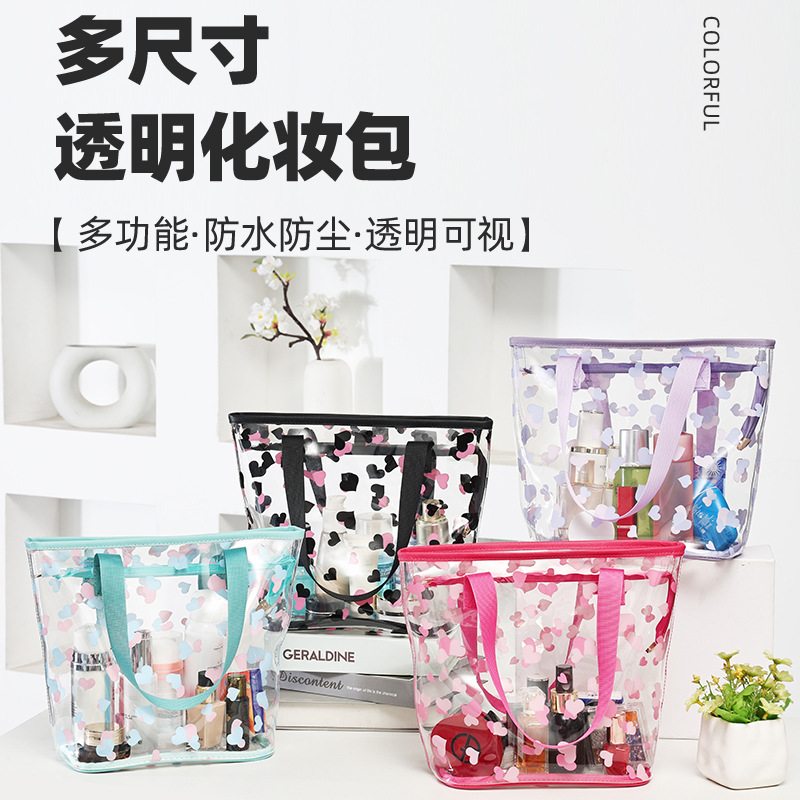 Factory direct sales transparent printed cosmetic bags, portable large-capacity waterproof pvc storage bags, ladies' hand-held toiletries bags full figure