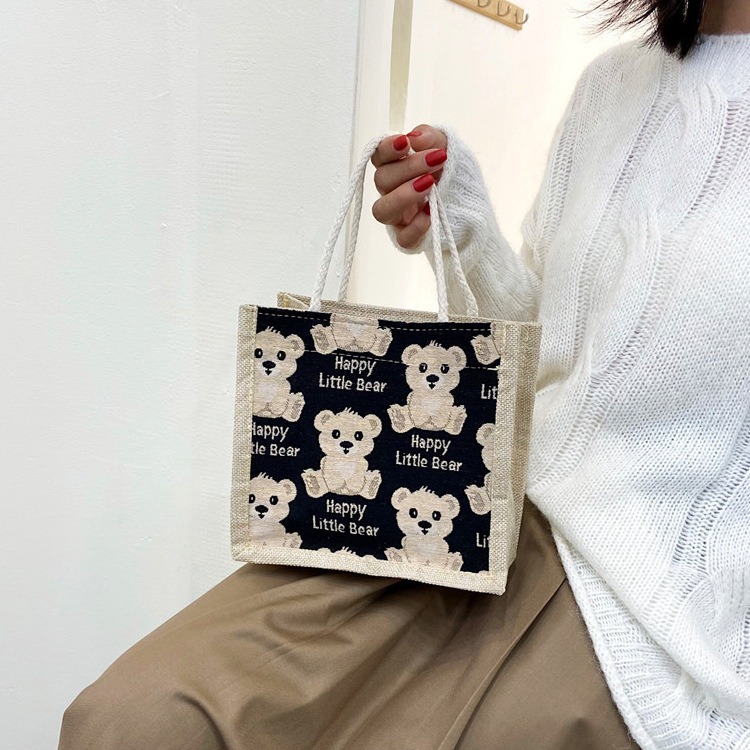 Cute hand-held linen bag 2022 new style women's bag, hand-held bento bag, simple lunch bag for office workers with rice Application Scenario
