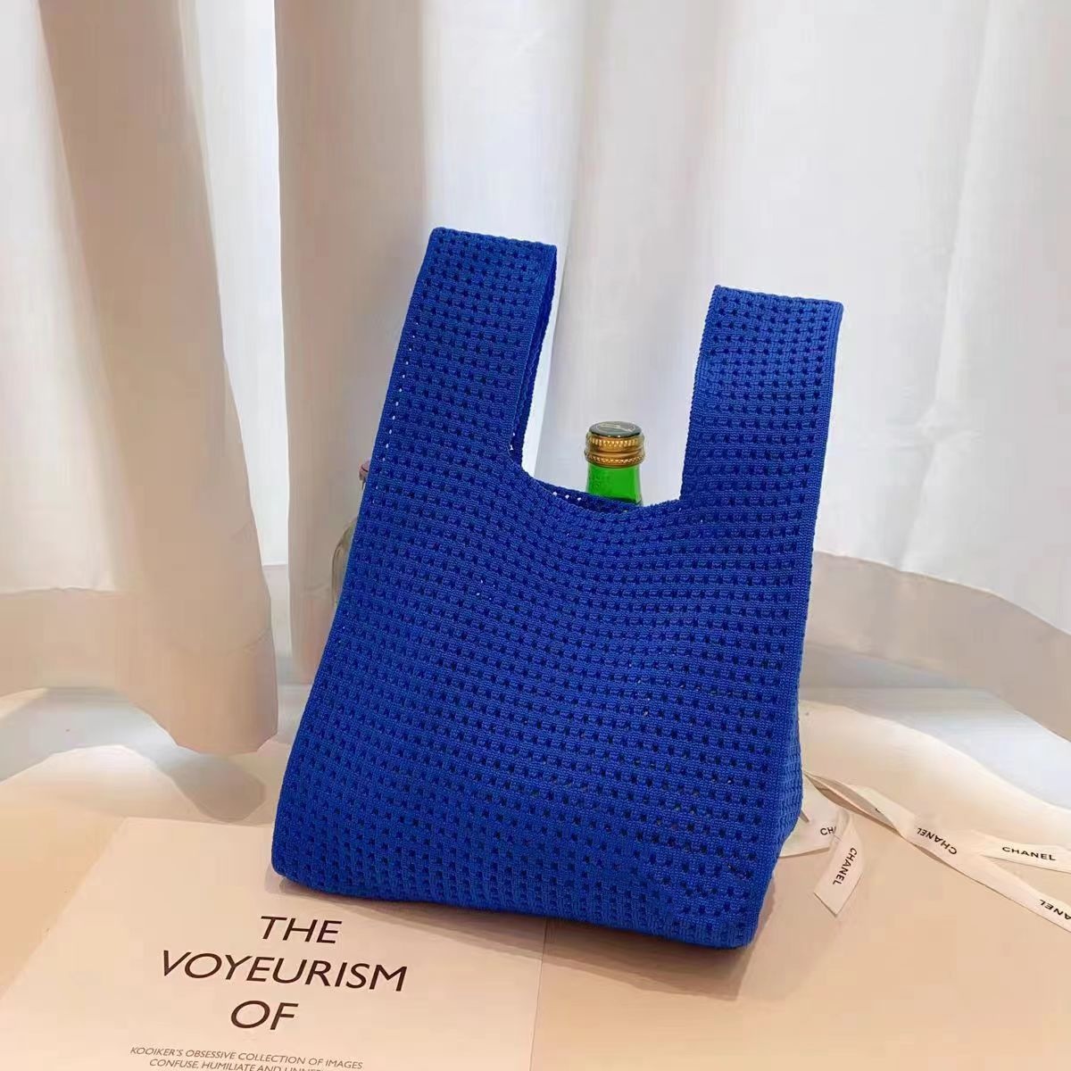 Korean chic simple and retro hollowed-out knitted handbag, shoulder bag, women's vest bag, open woolen bag, shopping bag Application Scenario