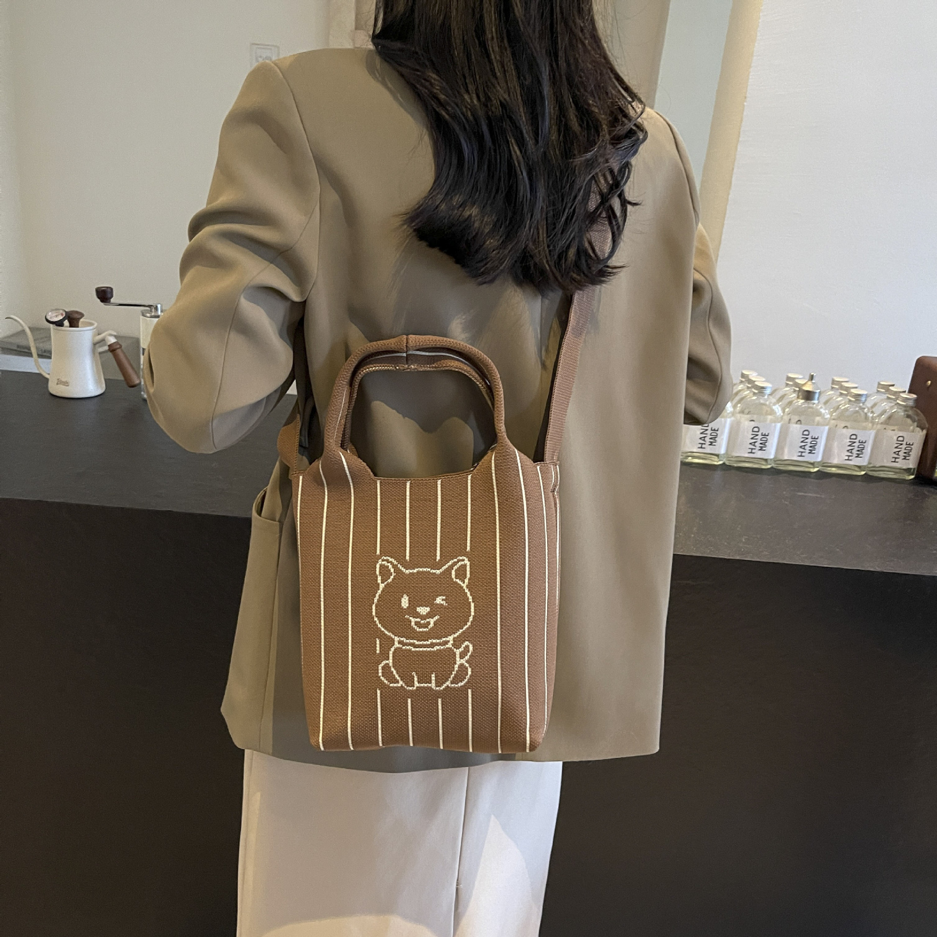 This handbag is a stylish knitted striped shopping bag. It's a popular lady's bear large-capacity tote single-shoulder bag for going out Specification drawing