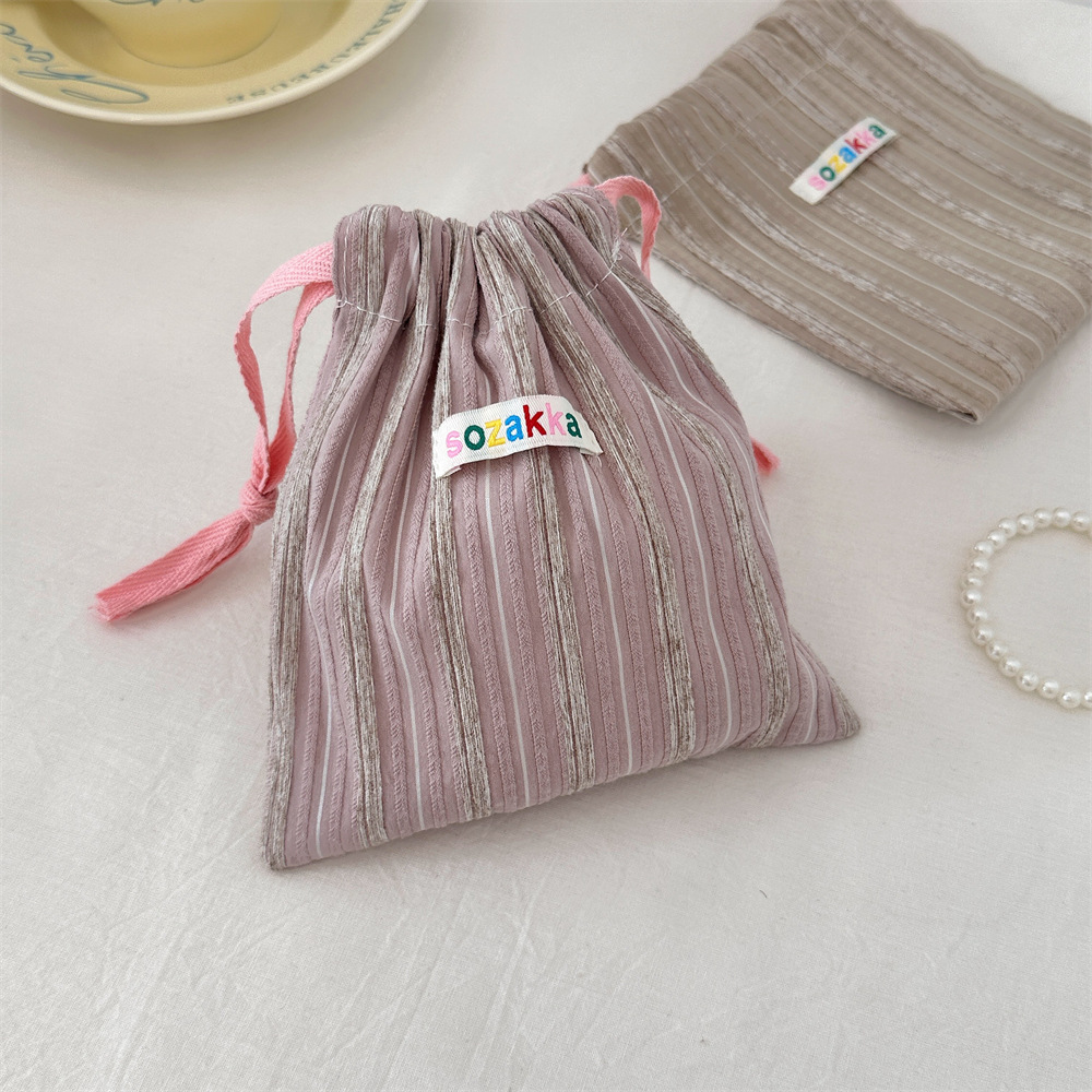 43222 vertical striped storage bag, drawstring drawstring pocket, travel portable cosmetics organizing bag, small miscellaneous bag details Picture