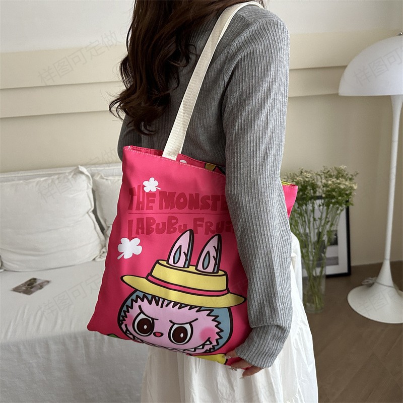 Large-capacity versatile canvas bag, cute cartoon shopping bag for girls, high appearance level student hand-held tutorial bag pattern sample details Picture