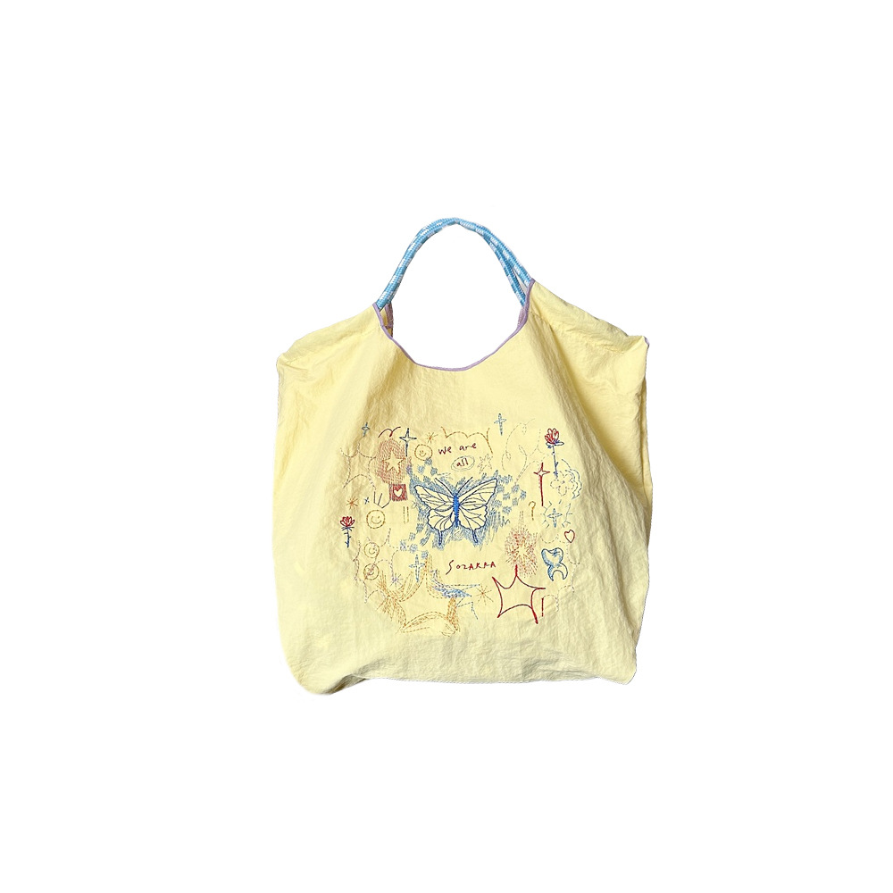 45301 Korean-style fresh and delicate embroidered hand-held Oxford bag, a sweet shopping bag for girls and a handbag for students in class Item Picture