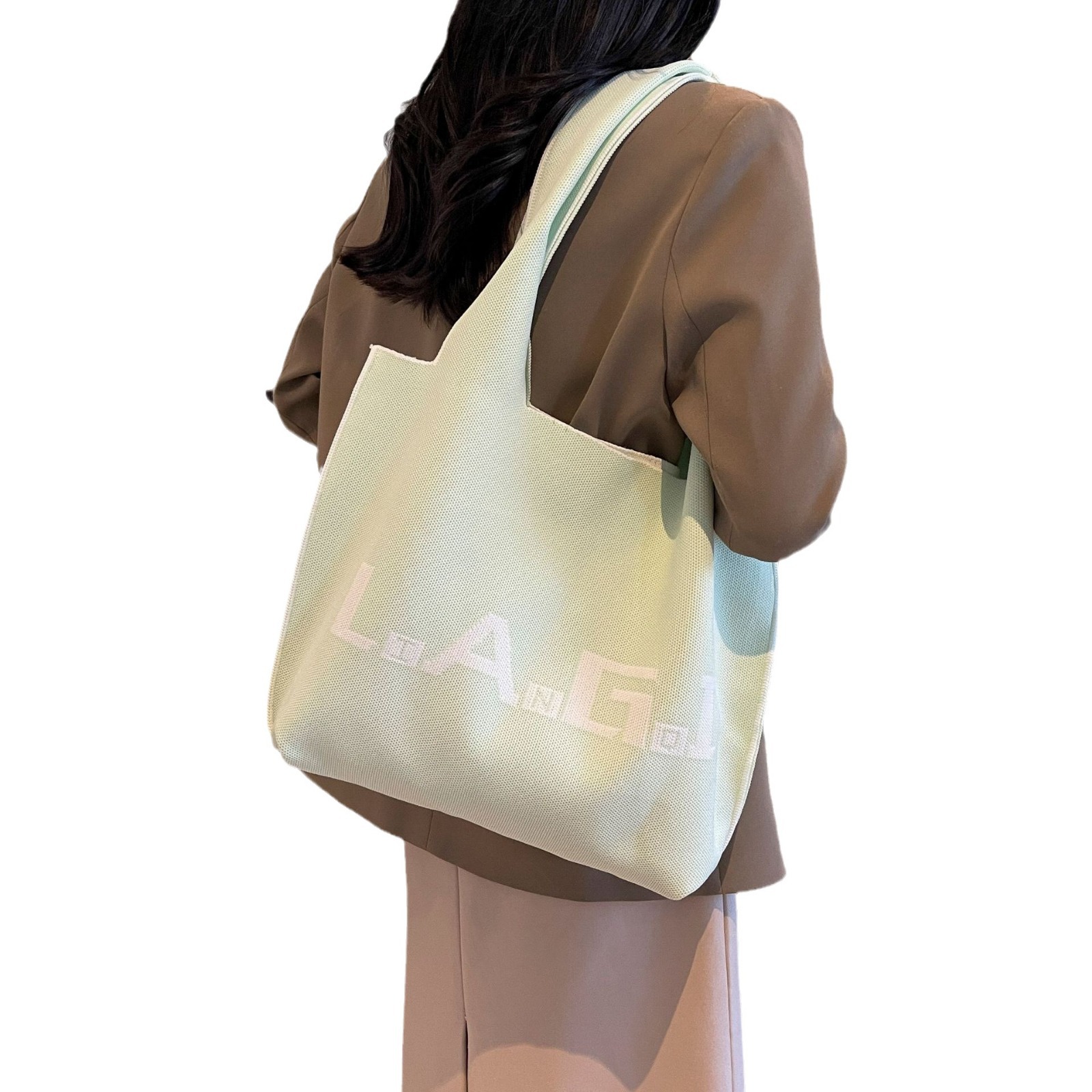 Knitted bag, simple and large-capacity single-shoulder bag, fashionable striped bucket bag for students going out, new tote bag for commuting to work Item Picture