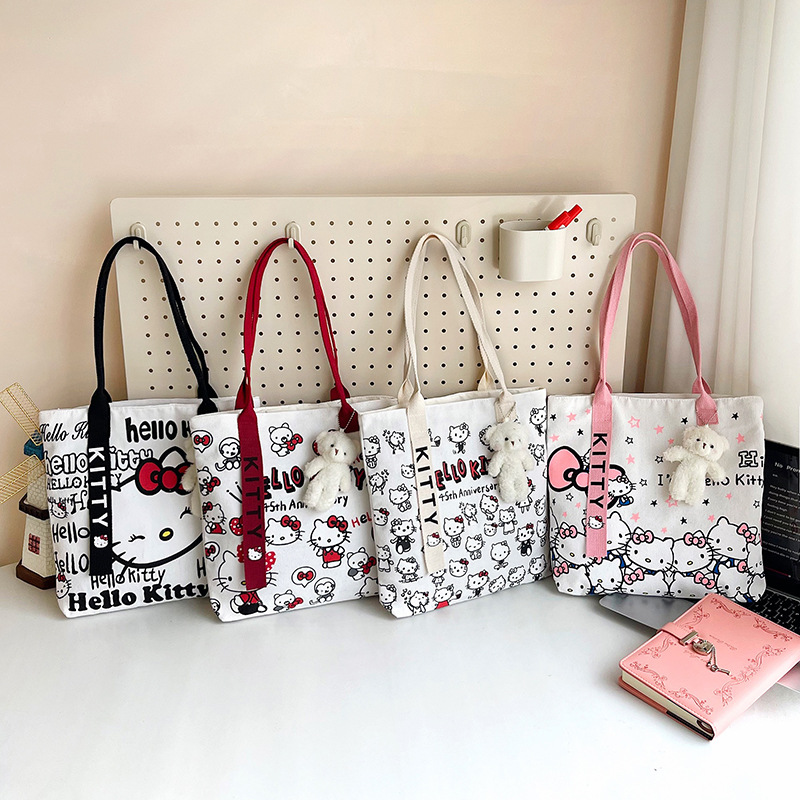 The new fashionable cartoon canvas bag, simple and versatile tote bag, cute commuting single-shoulder tote large bag, is selling well across borders full figure